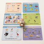 Six colorful educational flashcards for children arranged on a white surface, with a small chipmunk figurine standing in the center. The cards cover topics such as body parts, acids/fruits, stories, animals in the garden, recreational supplies, and around the world.